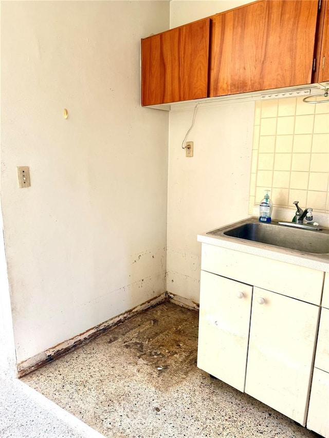 laundry room with sink