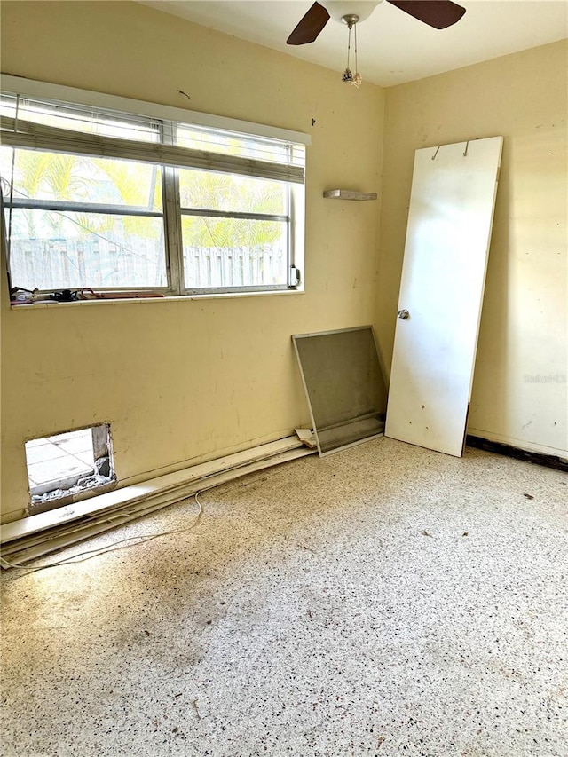 spare room featuring ceiling fan