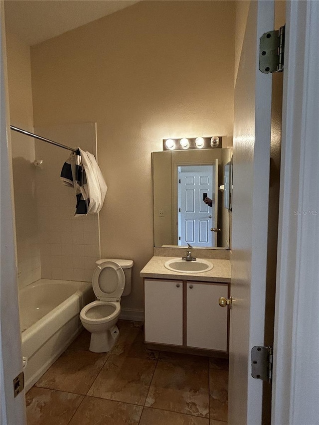 full bathroom featuring bathtub / shower combination, tile patterned floors, vanity, and toilet