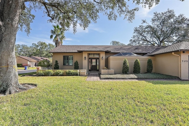 view of front of home with a front yard