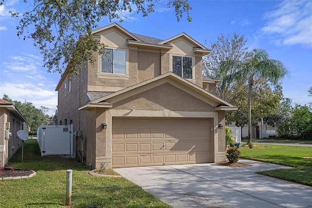 view of front facade with a front yard and a garage