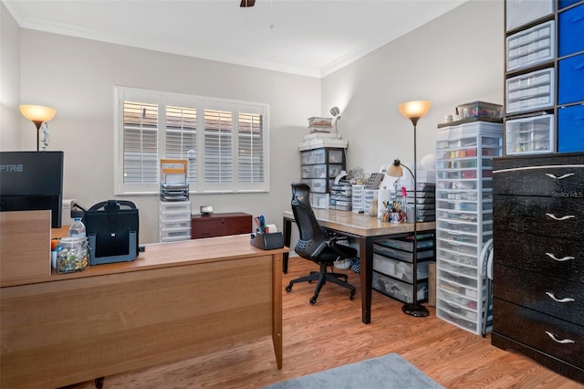 home office featuring hardwood / wood-style flooring and ornamental molding