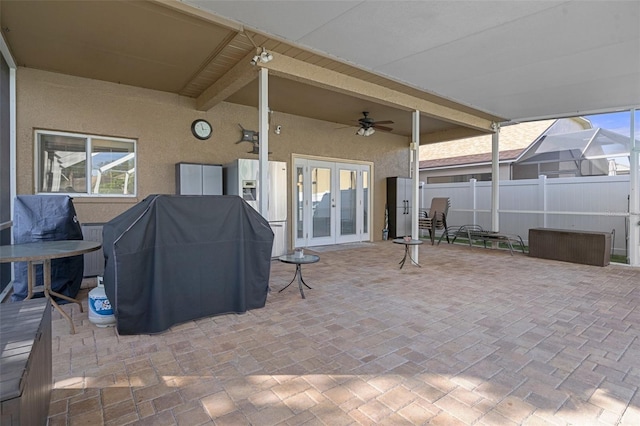 view of patio / terrace with ceiling fan, area for grilling, and french doors