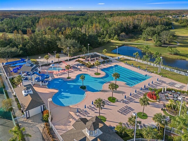 view of pool featuring a water view