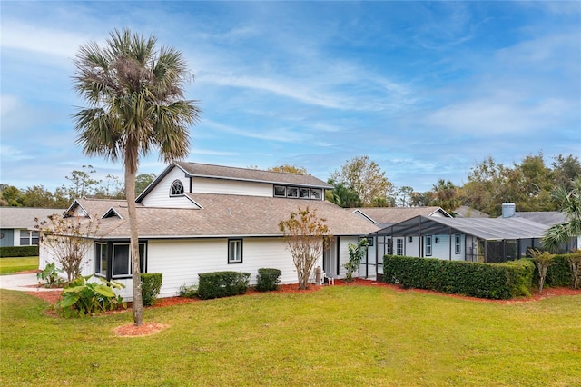 view of front of house with a front lawn