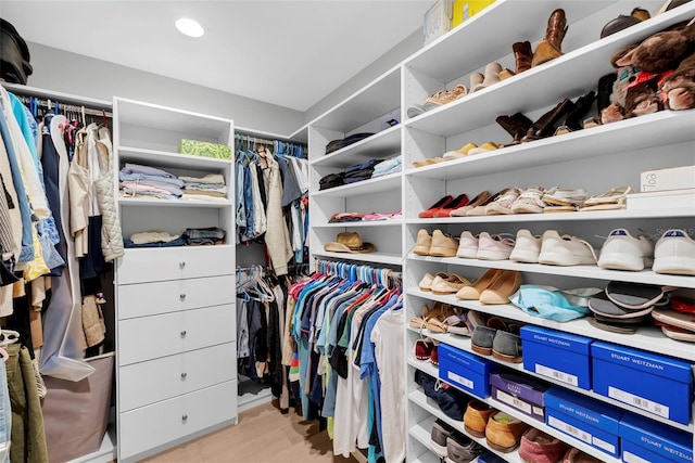 spacious closet featuring light wood-type flooring