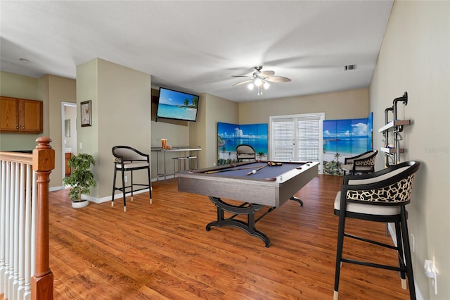 rec room featuring hardwood / wood-style flooring, ceiling fan, and billiards