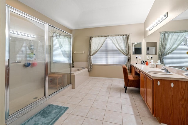 bathroom featuring vanity, tile patterned floors, and independent shower and bath