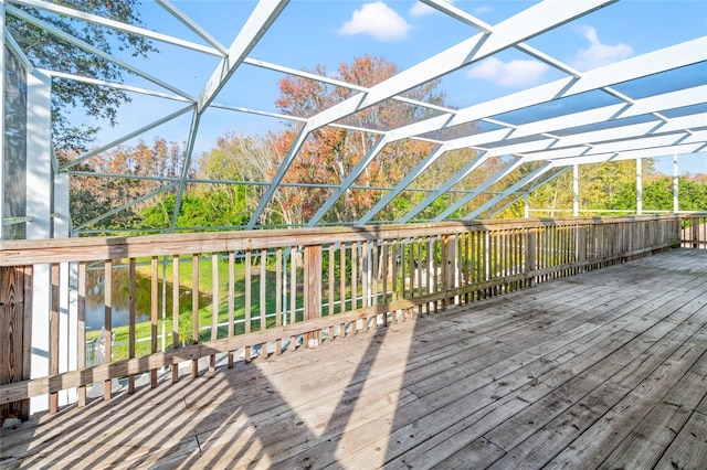 wooden deck with a water view