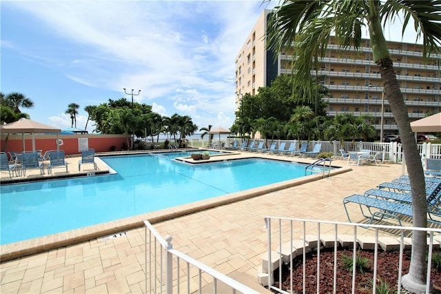 view of swimming pool featuring a patio