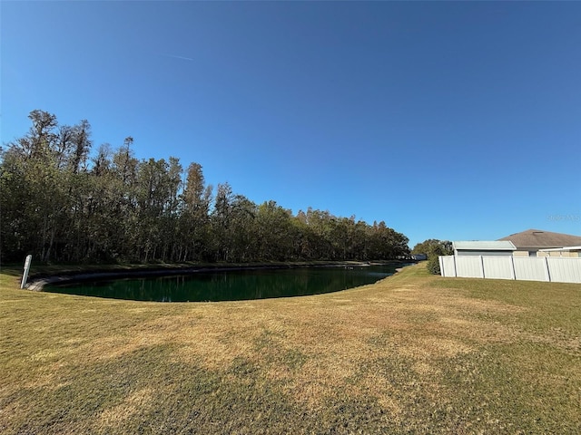 view of yard with a water view