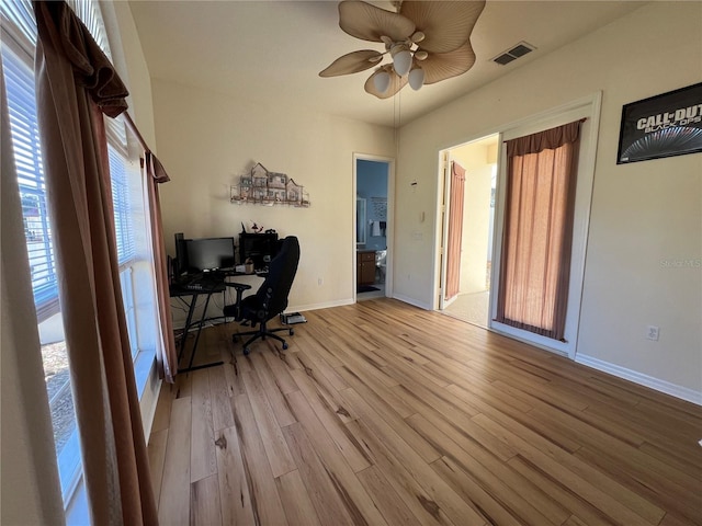 office area featuring ceiling fan and light wood-type flooring