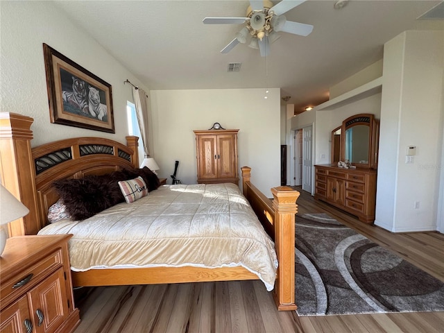 bedroom featuring ceiling fan and wood-type flooring