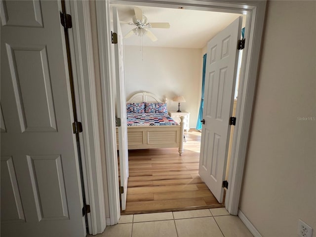 hall with light hardwood / wood-style flooring