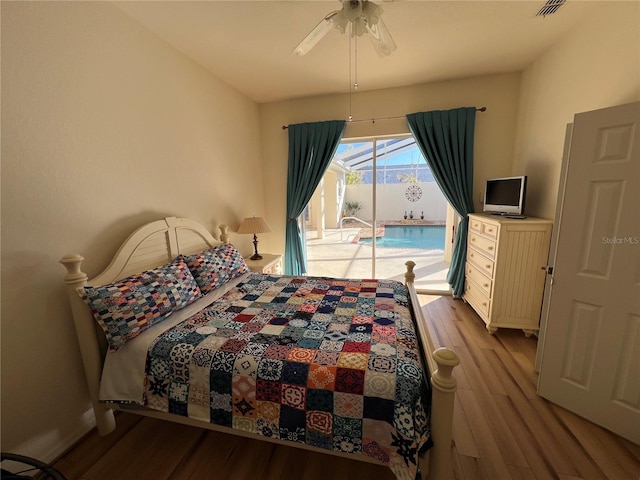 bedroom with ceiling fan, light wood-type flooring, and access to outside