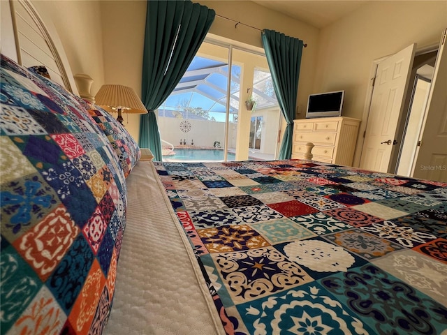 bedroom featuring access to exterior and carpet