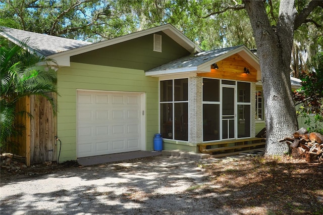 view of side of home with a garage