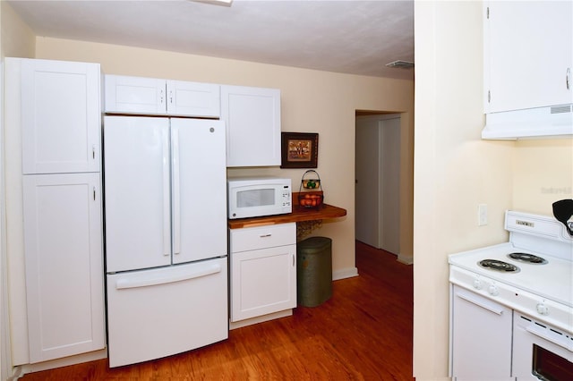 kitchen with dark hardwood / wood-style flooring, white appliances, white cabinetry, and exhaust hood