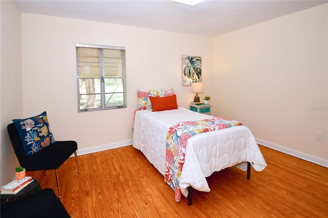 bedroom featuring hardwood / wood-style flooring