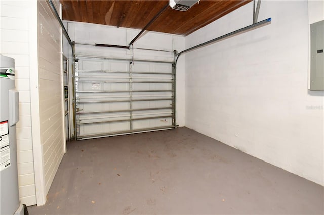 garage with electric panel and a garage door opener