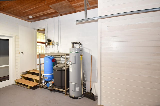 utility room with electric water heater