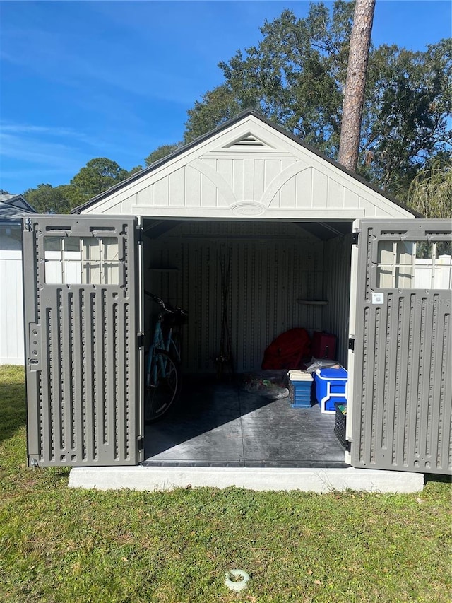 garage with a yard