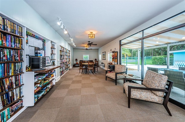 interior space featuring ceiling fan