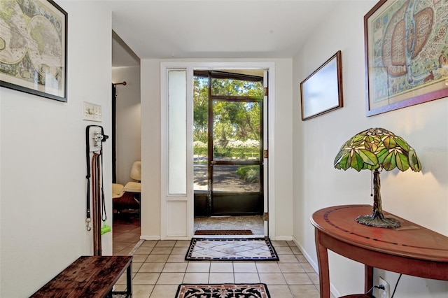 foyer entrance featuring light tile patterned floors