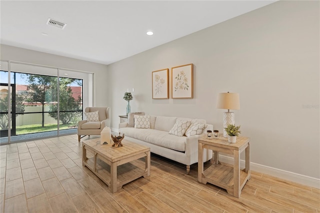 living room with light hardwood / wood-style floors