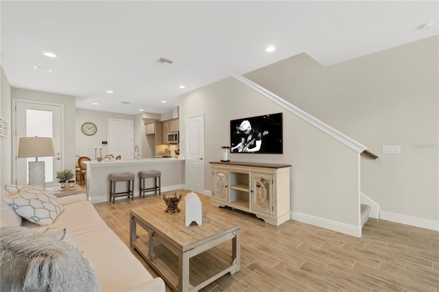 living room featuring light wood-type flooring