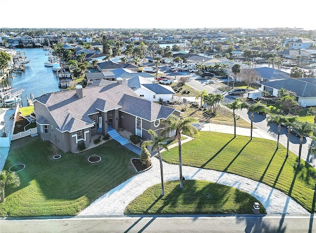 drone / aerial view with a water view