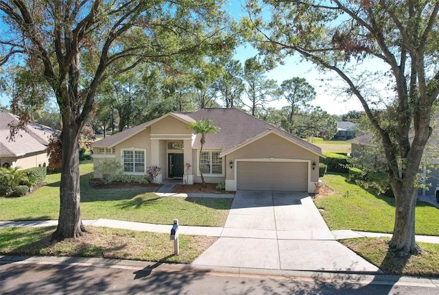 ranch-style house featuring a garage and a front yard