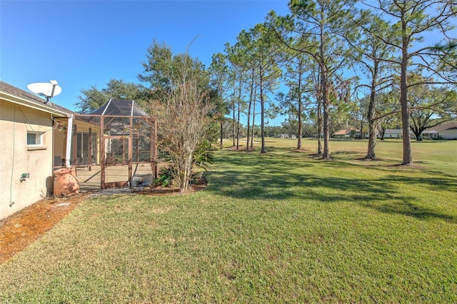 view of yard featuring a lanai