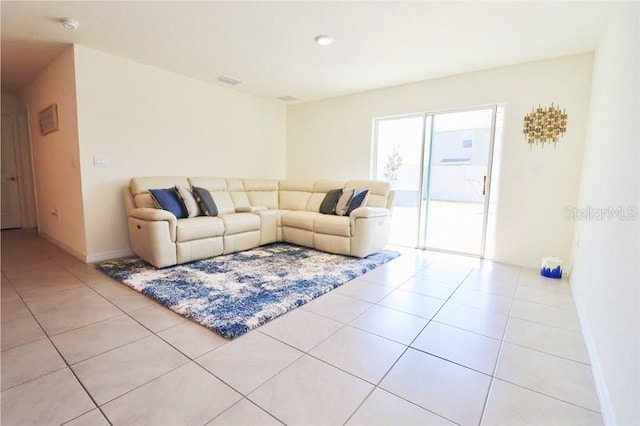 living room featuring light tile patterned floors