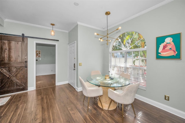 dining room featuring a barn door, dark hardwood / wood-style floors, ornamental molding, and a notable chandelier