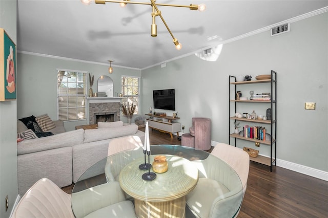 living room featuring crown molding and dark wood-type flooring