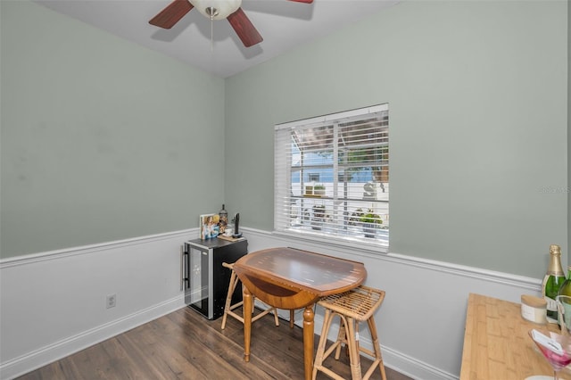 office space featuring ceiling fan and dark wood-type flooring