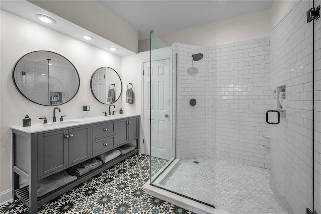 bathroom with vanity and walk in shower