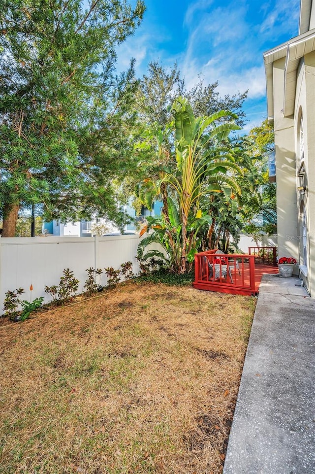 view of yard with a deck