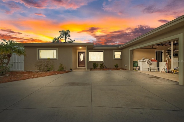 ranch-style house with a patio area