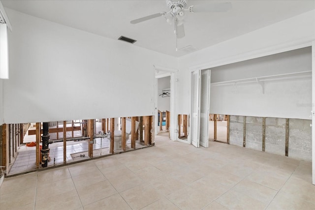 bedroom featuring ceiling fan and light tile patterned flooring