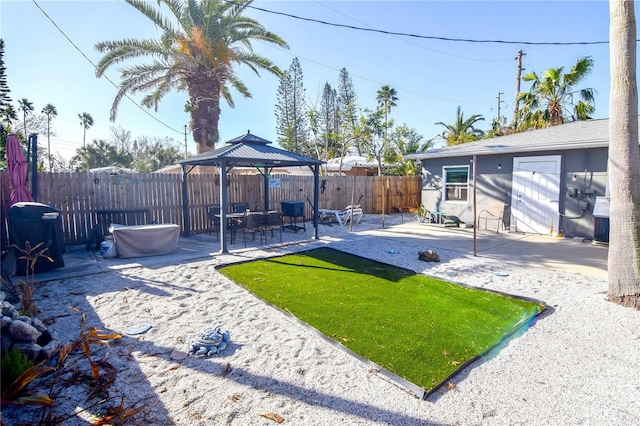 view of yard featuring a gazebo and a patio