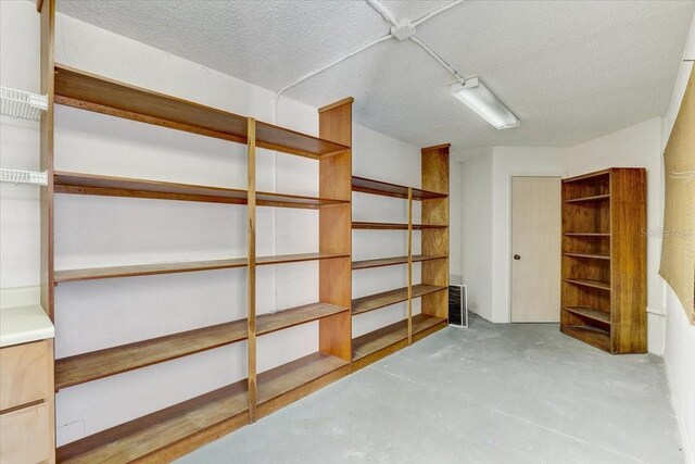 basement with a textured ceiling