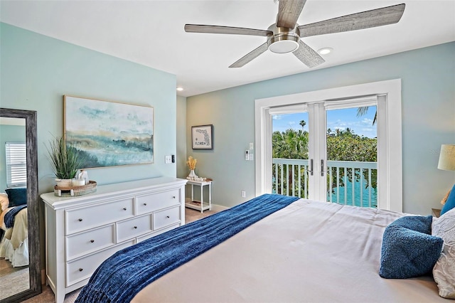 bedroom featuring ceiling fan, access to exterior, and multiple windows