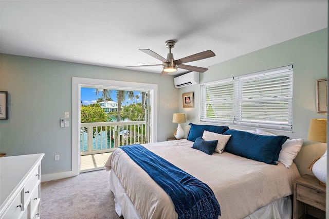 bedroom with ceiling fan, a wall mounted AC, access to exterior, and multiple windows