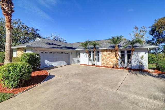 ranch-style home with a garage