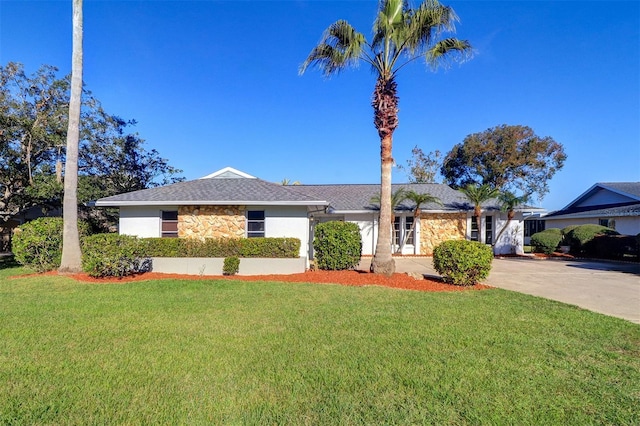 ranch-style house with a front yard