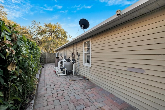 view of property exterior featuring a patio area