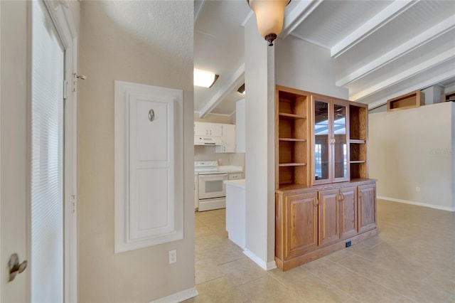 hallway featuring light tile patterned floors, lofted ceiling with beams, and a textured ceiling