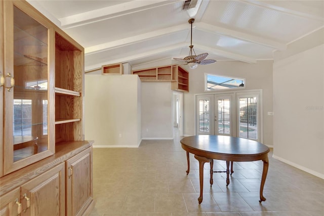 tiled dining room featuring french doors, lofted ceiling with beams, and ceiling fan